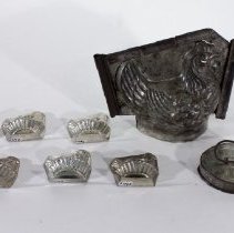 Seven tin chicken/chick molds - Front